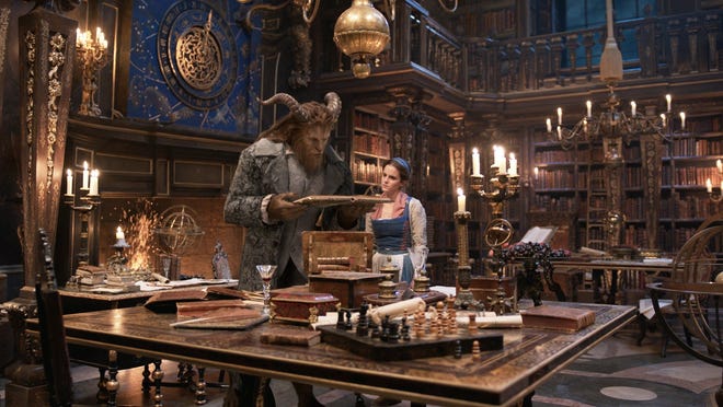 Dan Stevens, left, and Emma Watson star in Disney's "Beauty and the Beast." [DISNEY]