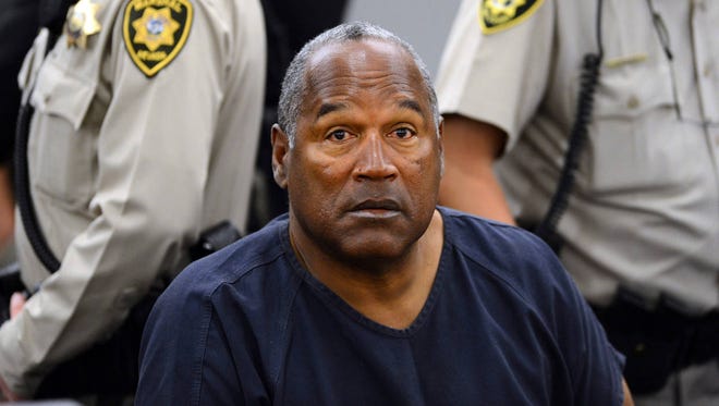 In this May 14, 2013 pool file photo, O.J. Simpson sits during a break on the second day of an evidentiary hearing in Clark County District Court in Las Vegas. (Associated Press)