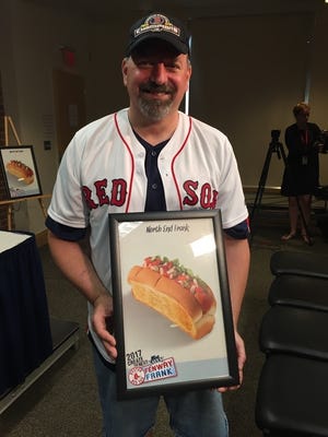 Blackstone resident and Chef Kenneth Allard is the 2017 Kayem Next Fenway Frank winner. His "North End Frank" topped with pesto, arugula, roasted red pepper, sundried tomato and fresh mozzarella is set to soon appear on the menu at Fenway Park. 

[Courtesy Photo]