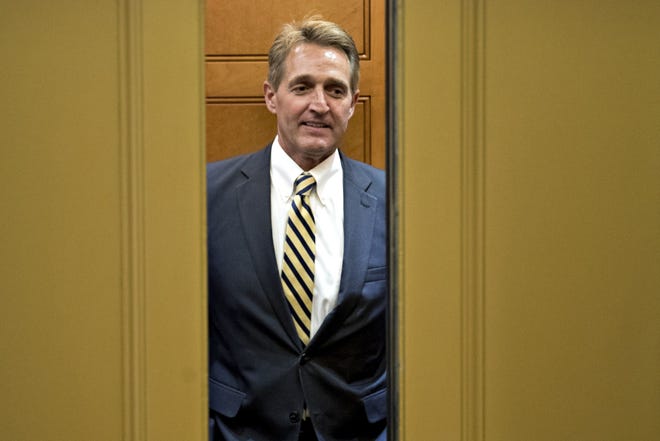 Sen. Jeff Flake, R-Ariz., in an elevator in the basement of the U.S. Capitol in Washington, D.C., on July 13, 2017. [Bloomberg photo by Andrew Harrer]