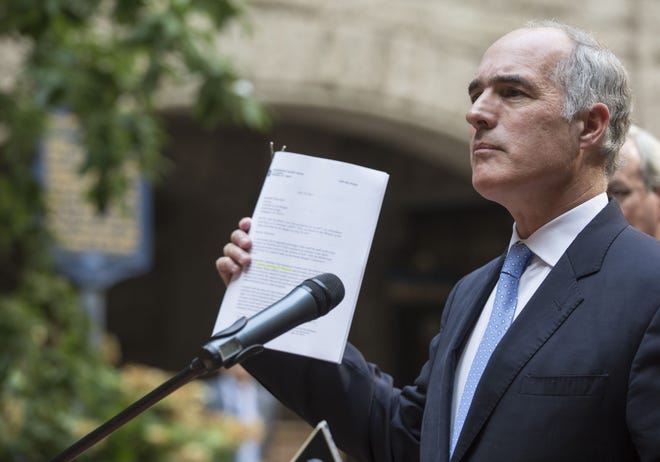 Sen. Bob Casey discusses possible changes to the nation's health-care system Friday outside the Allegheny County Courthouse.