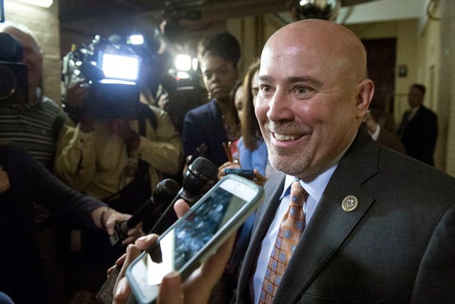 Rep. Tom MacArthur, R-N.J. speaks with reporters on Capitol Hill in Washington in May. Republicans aren't usually big on raising taxes, but they're really eager to eliminate the federal deduction for state and local taxes and a look at the states that benefit the most from the tax break helps explain it _ they are all Democratic strongholds. New York, Connecticut, New Jersey and California top the list of states where taxpayers get the biggest deductions.