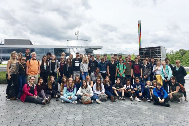 Students from Mount Shasta and Weed high schools are shown with German students, chaperones and German teachers during a visit to the Mercedes-Benz Museum in Stuttgart, Germany on June 29, 2017. The visit was part of a three-week trip taken by members of Siskiyou Union High School District's German American Exchange Program. Submitted photo