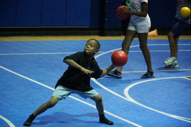 Travion Pettis, 6, participates in a friendly game of dodgeball at the Cleveland B & G Club Wednesday afternoon. [Jenna Wachsmuth/ The Star]