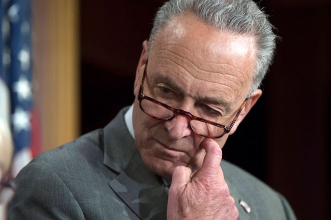 In this July 13, 2017 photo, Senate Minority Leader Chuck Schumer of N.Y. pauses during a news conference on Capitol Hill in Washington. Congressional Democrats announced Saturday that a bipartisan group of House and Senate negotiators have reached an agreement on a sweeping Russia sanctions package to punish Moscow for meddling in the presidential election and its military aggression in Ukraine and Syria. Schumer called the sanctions legislation “strong” and he expected the legislation to be passed promptly. (AP Photo/J. Scott Applewhite)