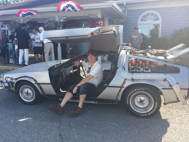 Scott gets back to the future by sitting in a DeLorean outside Thursday's Restaurant in Bridgewater, prior to Beaver County BOOM on June 24.