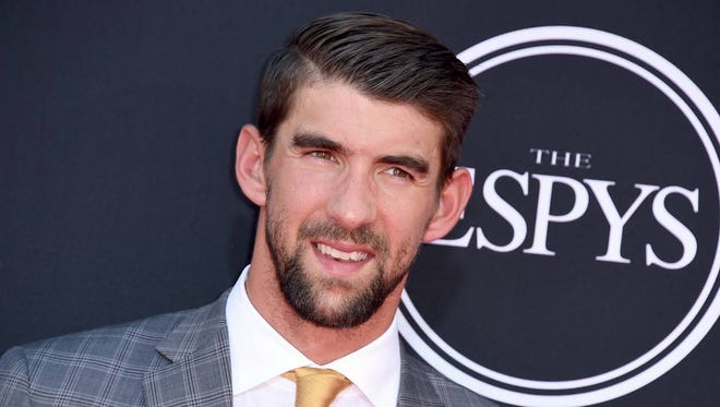 Michael Phelps arrives at the ESPYS at the Microsoft Theater on Wednesday, July 12, 2017, in Los Angeles. (Photo by Jordan Strauss/Invision/AP)