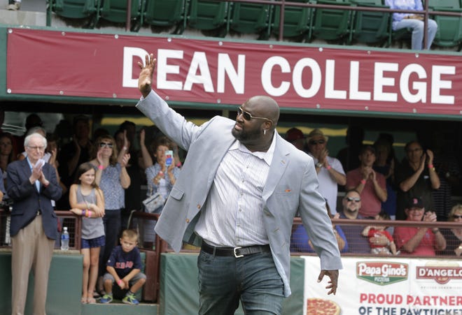PawSox and Red Sox great Mo Vaughn waves to the crowd on Sunday after being introduced during the hall of fame ceremony at McCoy Stadium. [The Providence Journal / Kris Craig]
