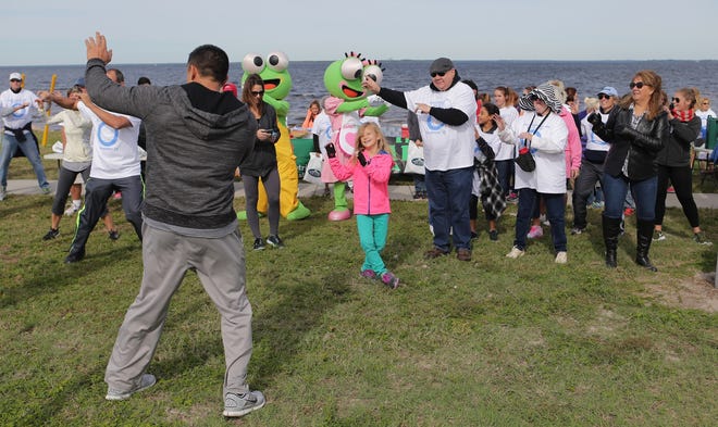 People participate in a Zumba demonstration before a walk for diabetes awareness. Several diabetes support groups meet regularly in Bay County. [HEATHER HOWARD/NEWS HERALD FILE PHOTO]
