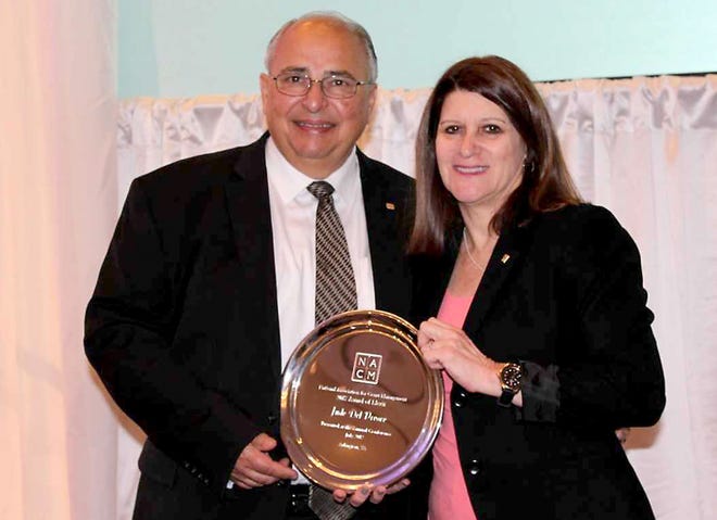 Jude Del Preore, trial court administrator for the Superior Court of Burlington County, recently received the national award of merit from the National Association for Court Management at its annual conference in Arlington, Virginia. Seen with Del Preore is Michele Oken, past president of the association.