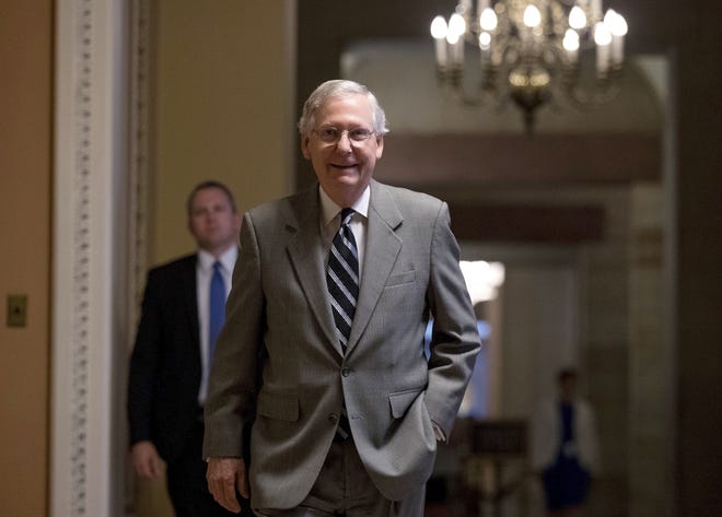 In this July 20, 2017, photo, Senate Majority Leader Mitch McConnell of Ky. walks into the Senate Chamber at the Capitol in Washington. A brutal reality is settling over Capitol Hill: The Republican effort to repeal and replace “Obamacare,” which has consumed the first six months of the Trump administration, may never yield results. Not only that, the GOP goal of overhauling the tax code requires passing a budget that is months overdue. (AP Photo/Andrew Harnik)