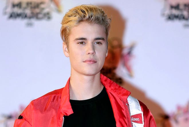 In this Nov. 7, 2015 file photo, Justin Bieber arrives at the Cannes festival palace in Cannes, southeastern France. Bieber is canceling the rest of his Purpose World Tour â€œdue to unforeseen circumstances.â€ In a statement released Monday, July 24, 2017, his representatives didnâ€™t offer details about the cancellation but said the singer â€œloves his fans and hates to disappoint them.â€ He has been on the tour for the last 18 months, playing more than 150 shows in six continents. (AP Photo/Lionel Cironneau, File)