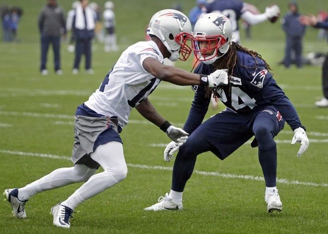 New Patriots cornerback Stephon Gilmore (24) covers new wide receiver Brandin Cooks, left, during practice last month. The competition for wide receiver spots is expected to be particularly intense when training camp opens Thursday in Foxboro.