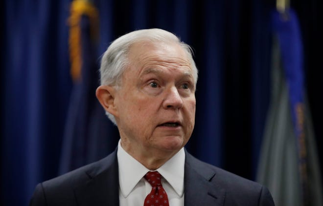In this July 21 photo, Attorney General Jeff Sessions speaks in Philadelphia. President Donald Trump took a new swipe at Sessions on Monday, referring to him in a tweet as 'beleaguered' and wondering why Sessions isn't digging into Hillary Clinton's alleged contacts with Russia. [MATT ROURKE/AP PHOTO]