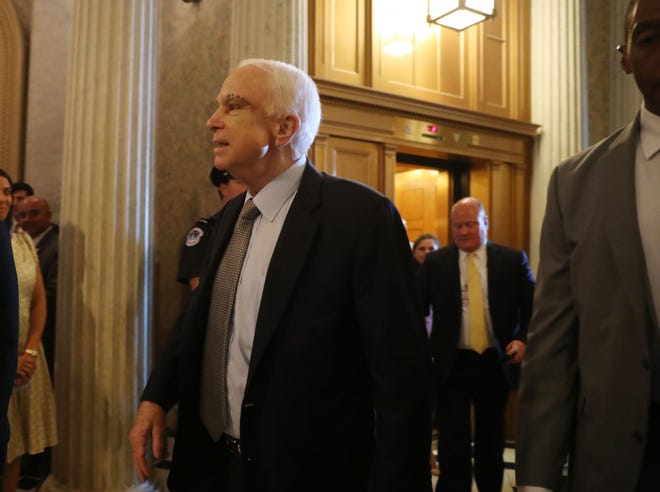 Sen. John McCain, R-Ariz. arrives on Capitol Hill in Washington, Tuesday, July 25, 2017, as the Senate was to vote on moving head on health care with the goal of erasing much of Barack Obama's law. (AP Photo/Andrew Harnik)