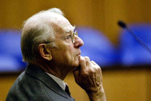 Former Catholic priest Paul Shanley listens to Middlesex Superior Court Judge Stephen Neel as he speaks about the jury selection process for Shanley's child rape trial, in 2005. (AP Photo/Tom Landers, Pool)