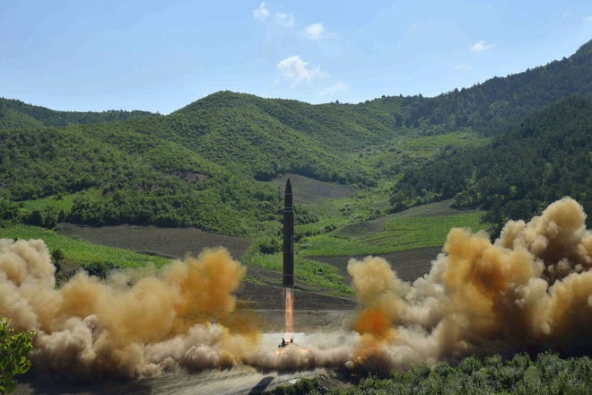 This July 4 photo distributed by the North Korean government shows what was said to be the launch of a Hwasong-14 intercontinental ballistic missile in North Korea. North Korea will be able to field a reliable, nuclear-capable intercontinental ballistic missile (ICBM) as early as next year, U.S. officials have concluded in a confidential assessment. [KOREAN CENTRAL NEWS AGENCY/KOREA NEWS SERVICE FILE VIA AP]