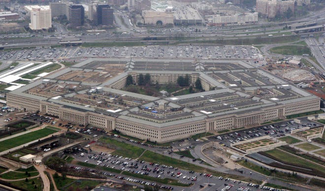 In this March 27, 2008 file photo, the Pentagon is seen in this aerial view in Washington. President Donald Trump says he will bar transgender individuals from serving in any capacity in the armed forces. Trump said on Twitter Wednesday, July 26, 2017, that after consulting with "Generals and military experts," the government "will not accept or allow Transgender individuals to serve in any capacity in the U.S. Military."

 (AP Photo/Charles Dharapak, File)