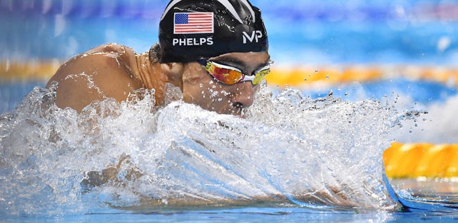 Michael Phelps earns his 22nd career Olympic gold medal, with a victory in the 200-meter Individual Medley, during the Summer Games at the Olympic Aquatics Stadium in Rio de Janeiro, Brazil, on Thursday, Aug. 11, 2016.