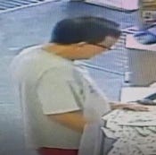Fort Smith police are attempting to identify this unknown person in connection with a forgeries/stolen bank card case. [Photo courtesy Fort Smith Police Department]