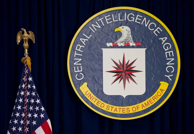 FILE - This April 13, 2016, file photo shows the seal of the Central Intelligence Agency at CIA headquarters in Langley, Va. A hearing in a lawsuit stemming from the agency's harsh interrogation techniques is scheduled for Friday, July 28, 2017 in Spokane, Wash. (AP Photo/Carolyn Kaster, File)