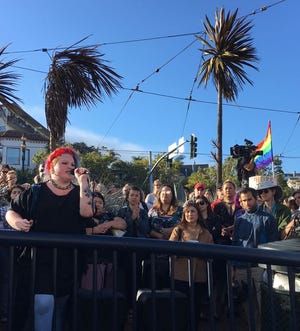 A transgender woman, who identified herself only as Layla, addresses protesters in the Castro District, Wednesday, July 26, 2017, in San Francisco. Demonstrators flocked to a plaza named for San Francisco gay-rights icon Harvey Milk to protest President Donald Trumpâ€™s abrupt ban on transgender troops in the military. (AP Photo/Olga R. Rodriguez)