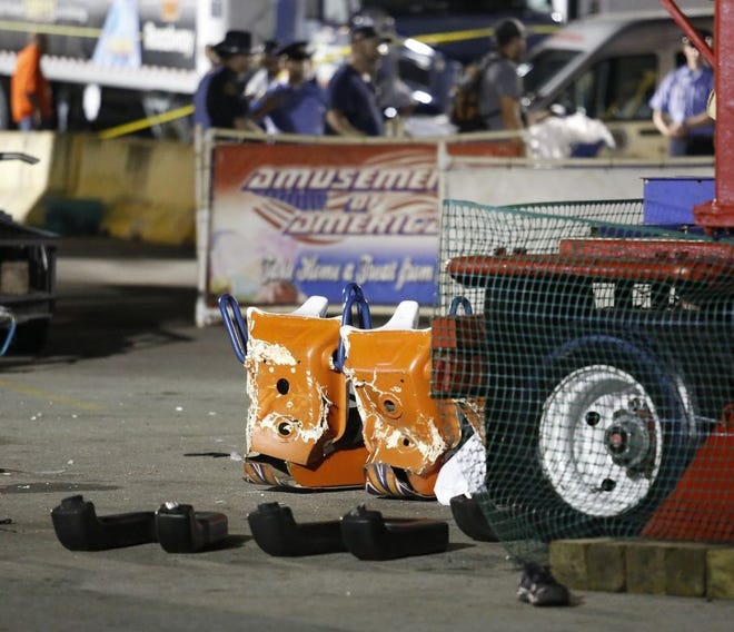One man died and seven others were injured when an amusement park ride, the Fireball, malfunctioned Wednesday at the Ohio State Fair. [Barbara J. Perenic/Dispatch]