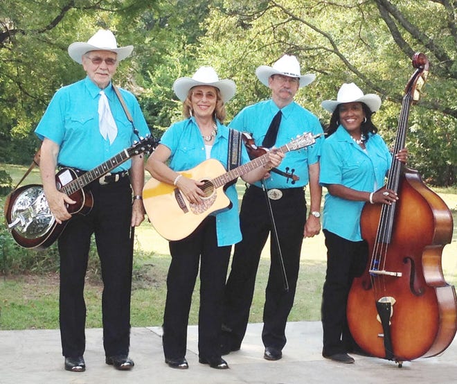 Members of the Mustang Ramblers are, from left, Jimmy Sides, dobro; Mara Sides, guitar and vocals; Les Calger, fiddle; and Audrey Calger, bass and vocals. [Photo provided by Mustang Ramblers]