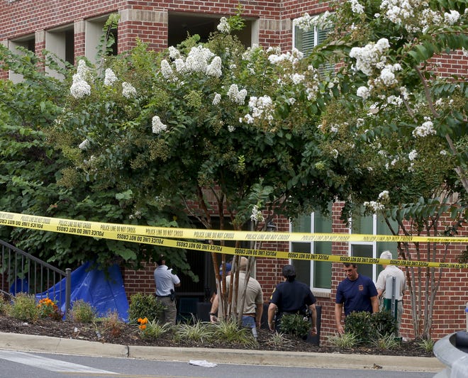 The body of Gina Lupo, 21, found outside The Lofts At City Center along 13th Street East at the intersection of 10th Avenue East in Tuscaloosa Friday morning, July 28, 2017. [Staff Photo/Gary Cosby Jr.]