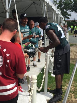 Alshon Jeffery took time out following a long practice on Friday to sign autographs for fans, saying "you have to give back. These are the people who support you."