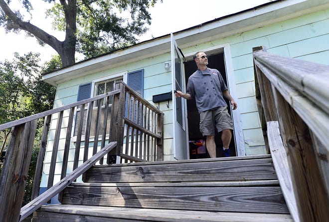 Kevin Warren lives in Hampton Heights, but shares the cost of the rental with a roommate. He said rents in the city were too high for him to afford his own apartment close to his job downtown. [ALEX HICKS JR./SPARTANBURG HERALD-JOURNAL]