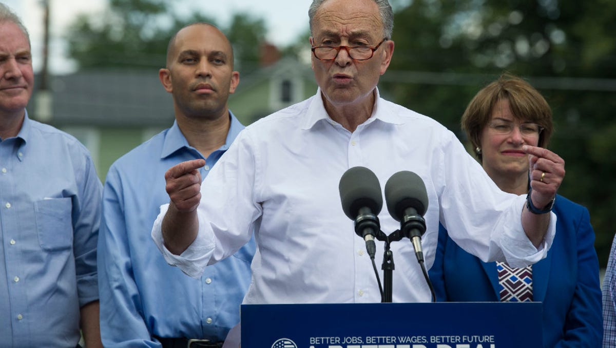 Senate Minority Leader Chuck Schumer of N.Y., accompanied by Congressional Democrats, speaks in Berryville, Va., Monday, July 24, 2017, to unveil their new agenda. From left are, Sen. Chris Van Hollen, D-Md., Rep. Hakeem Jeffries, D-N.Y., Schumer, and Sen. Amy Klobuchar, D-Minn.