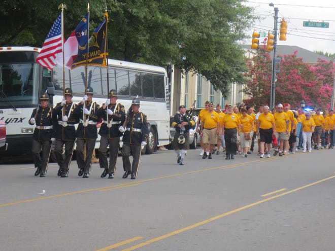 Veterans walk through uptown Shelby for the 2016 American Legion Walk for Veterans. [Special to The Star]