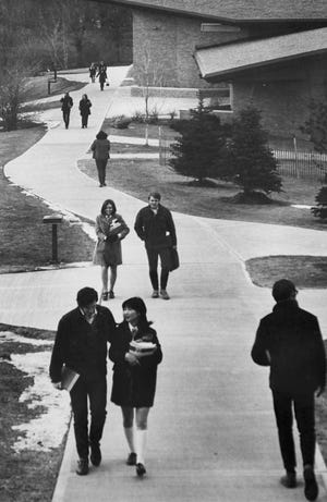 Students walk on the campus of Rockford College, now Rockford University, in 1970. Previous campuses for the school were along the Rock River (around Seminary Street) and in the old courthouse. [RRSTAR.COM FILE PHOTO]