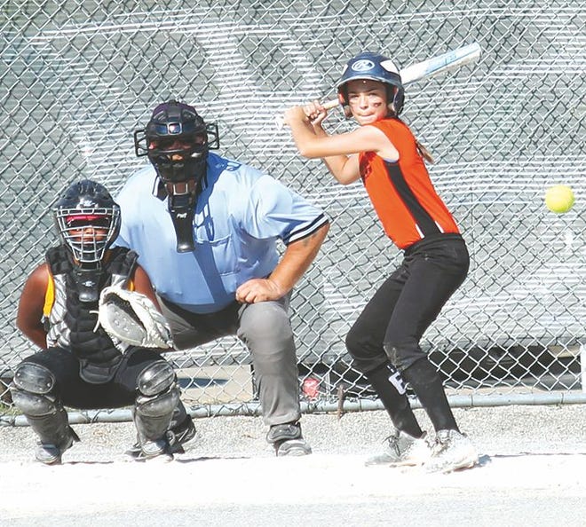 Cheboygan's Abbey Zilla (right) gets ready to swing at a pitch during a state tournament game in Van Buren this past weekend.