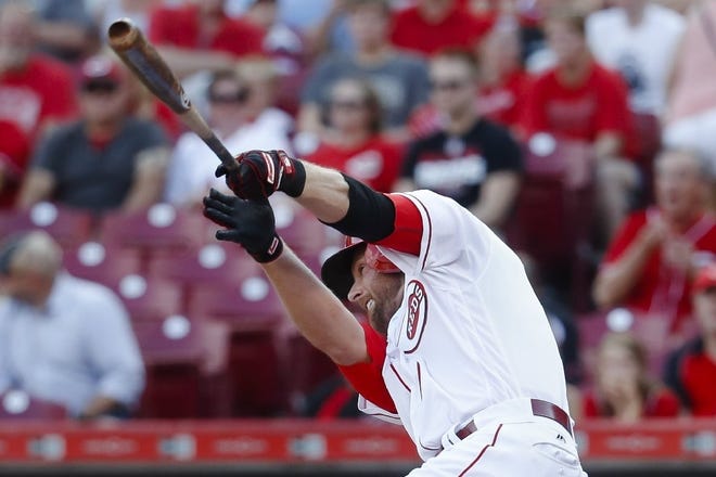 Cincinnati All-Star shortstop Zack Cozart is on the 10-day disabled list with a right quad injury. He could still be moved, but Cincinnati has little leverage. (AP Photo/John Minchillo)