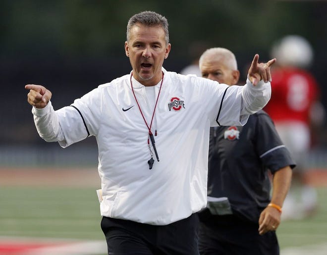 Ohio State Buckeyes head coach Urban Meyer during the first day of preseason practice at Woody Hayes Athletic Center on Thursday. [Kyle Robertson/Dispatch]