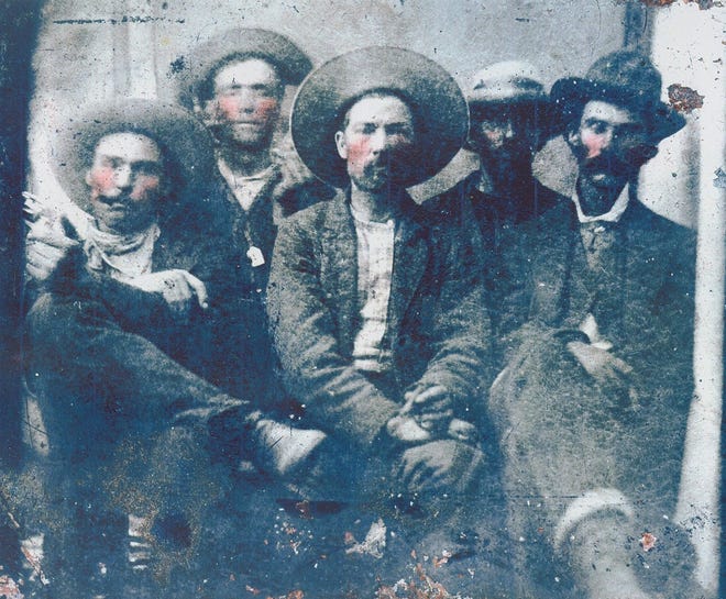 North Carolina attorney Frank Abrams believes the men in this tin type are Old West outlaws. He is researching a possible connection between the photograph and Clinton. From left, Dave Rudabaugh, Billy the Kid, Barney Mason, unknown, and Pat Garrett. [SUBMITTED PHOTO]