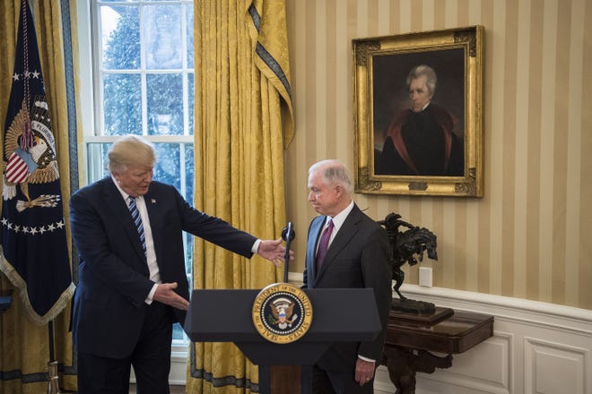 President Trump greets Attorney General Jeff Sessions during his swearing-in ceremony in the Oval Office on Feb. 9. [Washington Post photo by Jabin Botsford]