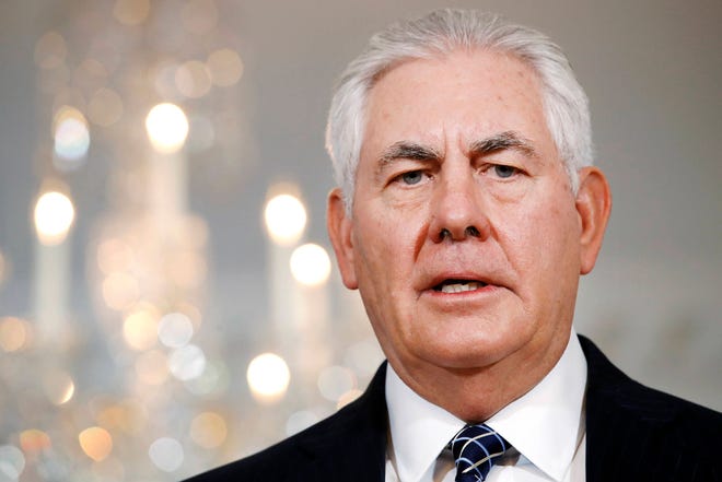 In this July 21, 2017 file photo, Secretary of State Rex Tillerson speaks at the State Department in Washington. Tillerson says neither he nor President Donald Trump is “very happy” about new sanctions on Russia that Congress has voted to put in place. (AP Photo/Jacquelyn Martin, File)