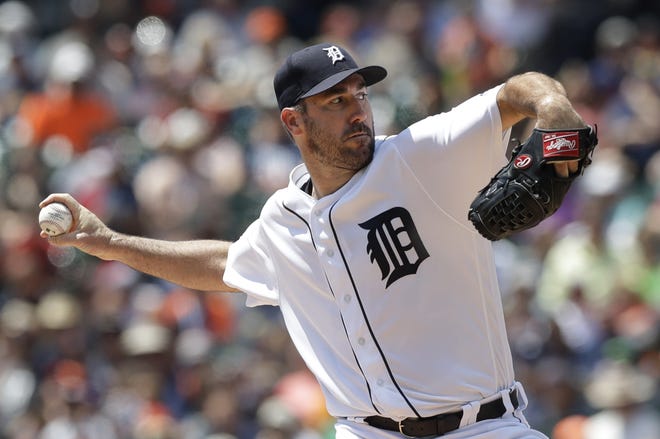 FILE - In this July 30, 2017, file photo, Detroit Tigers starting pitcher Justin Verlander throws during the first inning of a baseball game against the Houston Astros, in Detroit. (AP Photo/Carlos Osorio, File)