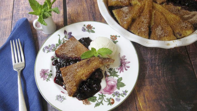 AP PHOTO/SARA MOULTON Blueberry pie with a cinnamon french toast crust is delicious both as breakfast and dessert.