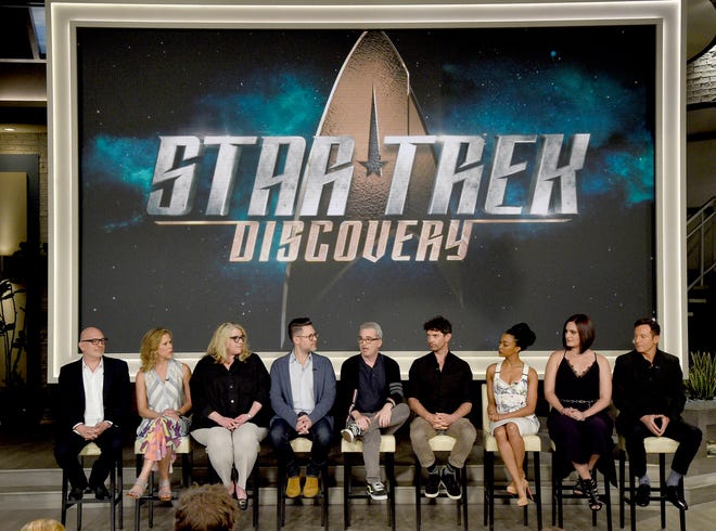 Executive producers Akiva Goldsman, from left, Heather Kadin, Gretchen Berg, Aaron Harberts and Alex Kurtzman and actors James Frain, Sonequa Martin-Green, Mary Chieffo and Jason Isaacs participate in the “Star: Trek Discovery” panel during the CBS Television Critics Association Summer Press Tour at CBS Studio Center on Tuesday, Aug. 1, 2017, in Beverly Hills, Calif. (Photo by Chris Pizzello/Invision/AP)