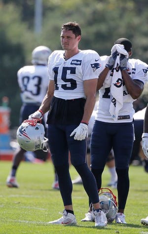 Chris Hogan finished Tuesday's practice with his knee wrapped up in ice.