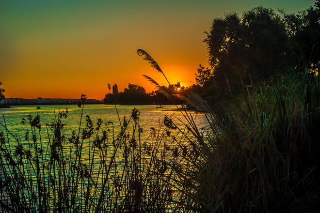 Sonia Avila of Stockton used a Nikon D700 DSLR camera to photograph a sunset on the deep water channel at Louis Park in Stockton. [SONIA AVILA/COURTESY]