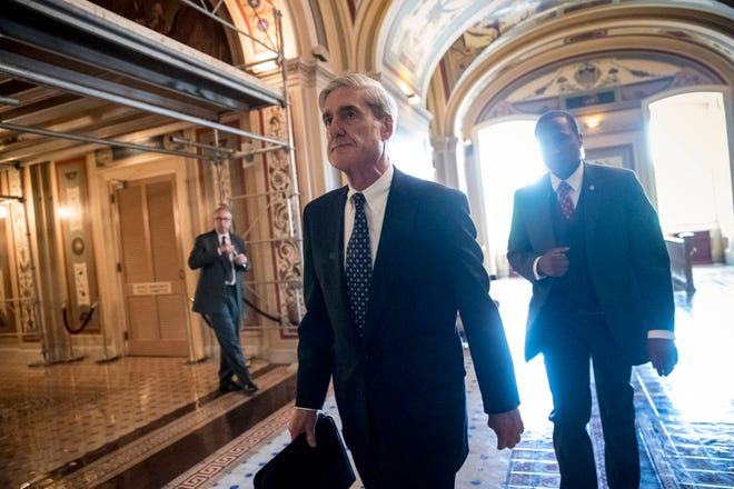 In this June 21, 2017, file photo, Special Counsel Robert Mueller departs after a closed-door meeting with members of the Senate Judiciary Committee about Russian meddling in the election at the Capitol in Washington. (AP Photo/J. Scott Applewhite, File)