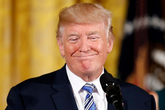 President Donald Trump smiles in the East Room of the White House in Washington, Tuesday, Aug. 1, 2017. (AP Photo/Alex Brandon)