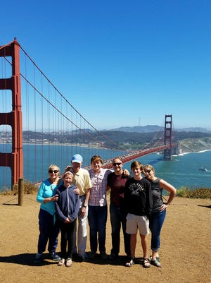 Mary and David Layton with their family at the Golden Gate Bridge in San Francisco.