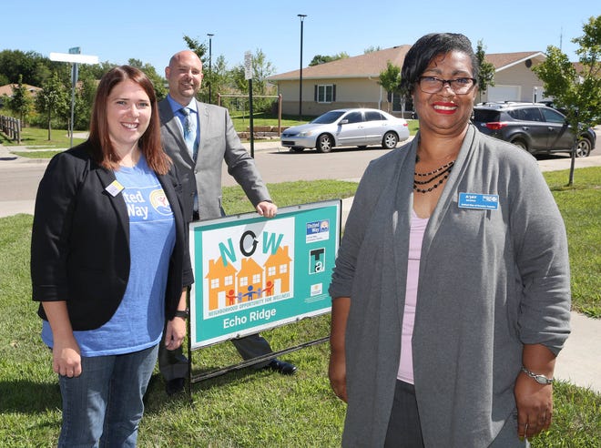 Multiple organizations support the work being done in public housing communities through the Neighborhood Opportunity for Wellness grant, donated by the Kansas Health Foundation. Pictured here are Jillian Fisher senior director of community impact, United Way of Greater Topeka, Trey George, executive director of THA Inc., and A’Jay Scipio, NOW community liaison. (Thad Allton/The Capital-Journal)