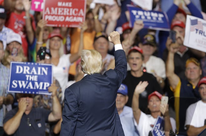 President Donald Trump reacts during a rally Thursday, Aug. 3, 2017, in Huntington, W.Va. (AP Photo/Darron Cummings)